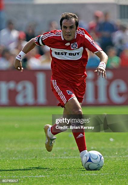 Cuauhtemoc Blanco of the Chicago Fire takes the ball up the field during the second half against the Kansas City Wizards at Toyota Park on April 20,...
