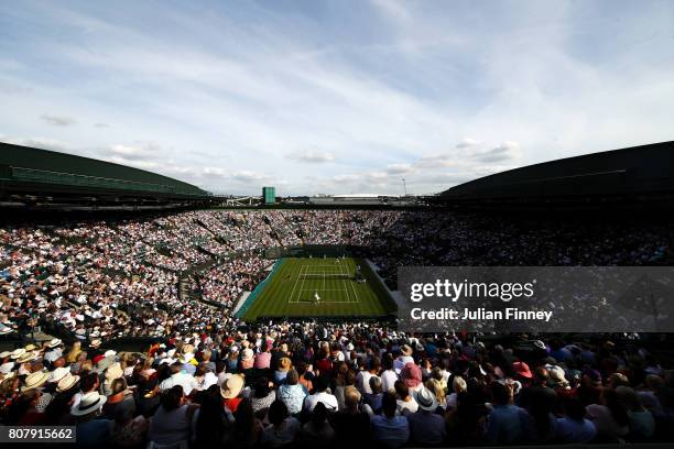 General view of Court 1 during the Gentlemen's Singles first round match between Dominic Thiem of Austria and Vasek Pospisil of Canada on day two of...