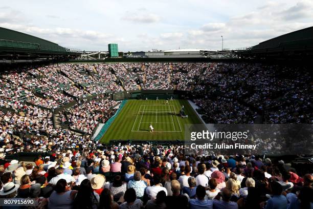 General view of Court 1 during the Gentlemen's Singles first round match between Dominic Thiem of Austria and Vasek Pospisil of Canada on day two of...