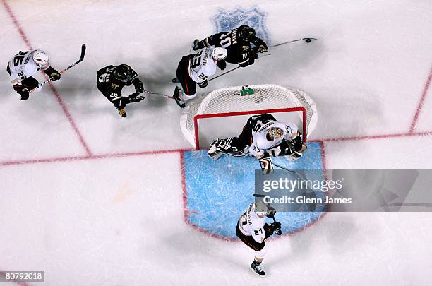 Brenden Morrow of the Dallas Stars is chased behind the net by Francois Beauchemin of the Anaheim Ducks during Game Six of the 2008 NHL Western...