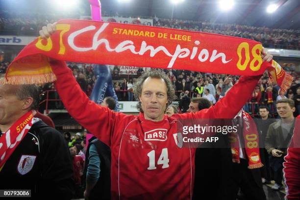 Standard's head coach Michel Preud'homme celebrates after the Belgian club Standard de Liege defeated RSCA Anderlecht, on day 31 of the Jupiler...