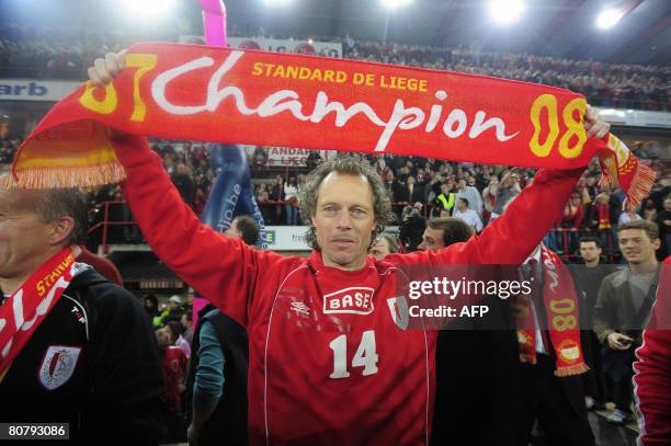 Standard's head coach Michel Preud'homme celebrates after the Belgian club Standard de Liege defeated RSCA Anderlecht, on day 31 of the Jupiler...