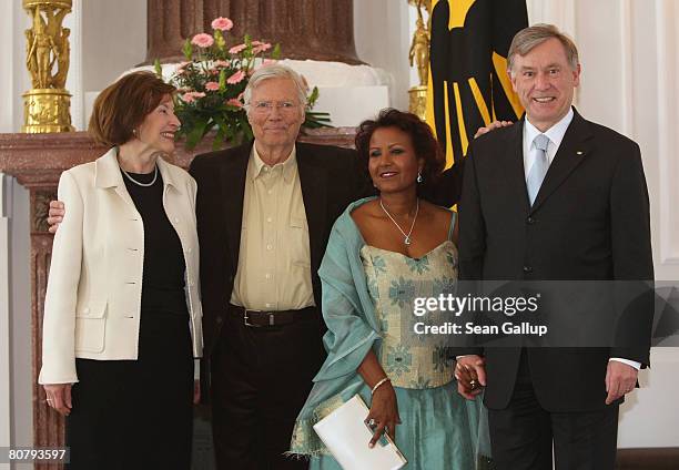 Austrian-born actor Karlheinz Boehm and his wife Almaz Boehm pose with German President Horst Koehler and First Lady Eva Luise Koehler at Bellevue...