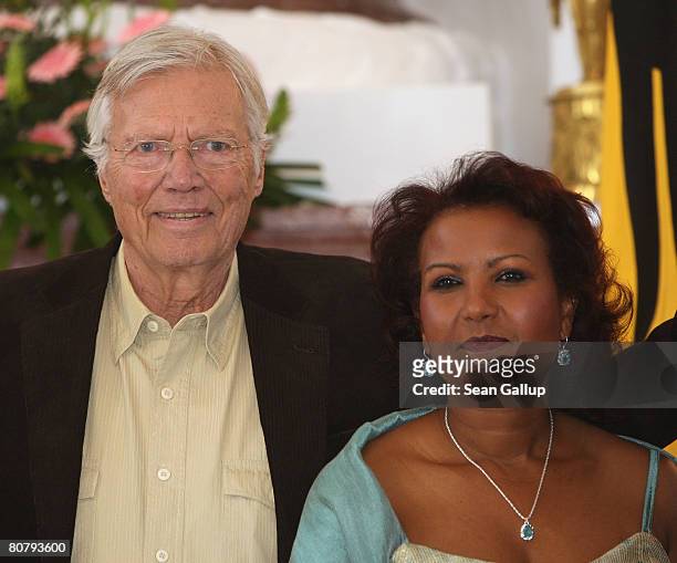 Austrian-born actor Karlheinz Boehm and his wife Almaz Boehm arrive at Bellevue Palace for a reception in honour of his 80th birthday given by German...