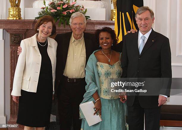 Austrian-born actor Karlheinz Boehm and his wife Almaz Boehm pose with German President Horst Koehler and First Lady Eva Luise Koehler at Bellevue...