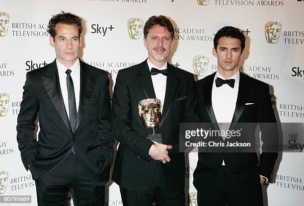 Adrian Pasdar, Tim Kring and Milo Ventimiglia from Heroes pose with the award for Best International Programme at the British Academy Television...