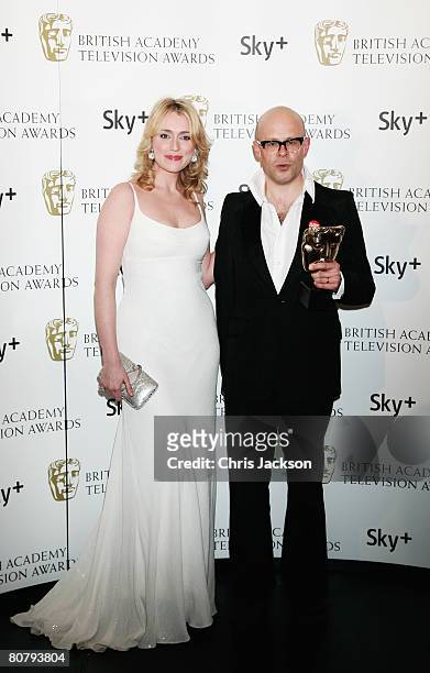Harry Hill poses with the award for Best Entertainment Programme with Keeley Hawes at the British Academy Television Awards 2008 at The Palladium on...