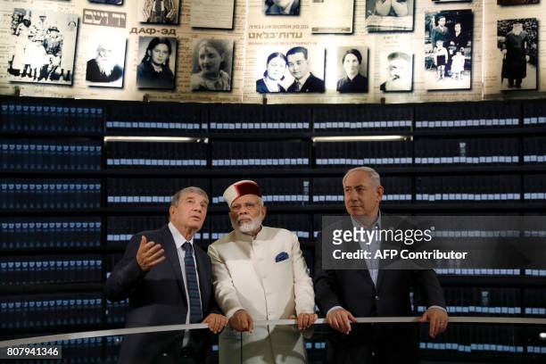 Indian Prime Minister Narendra Modi accompanied by Israeli Prime Minister Benjamin Netanyahu and Yad Vashem Chairman Avner Shalev visit the "Hall of...