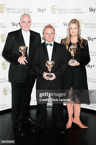 Brian Woods, Jezza Neumann and Kate Blewett pose with the award for Best Current Affairs Programme for 'China's Stolen Children' at the British...