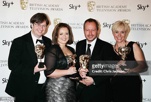 Simon Ford, Rachel Innes-Lumsden, Anthony Wonke and Ines Cavill pose with the award for Best Factual Series for 'The Tower: A Tale of Two Cities' at...