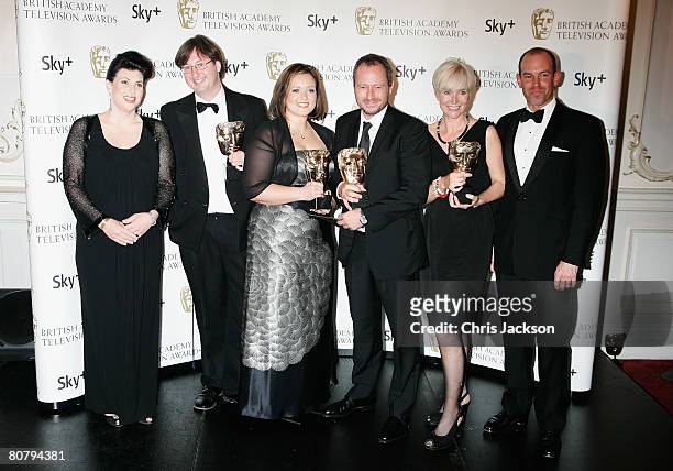 Kirstie Allsopp , Simon Ford, Rachel Innes-Lumsden, Anthony Wonke, Ines Cavill and Phil Spencer pose with the award for Best Factual Series for 'The...
