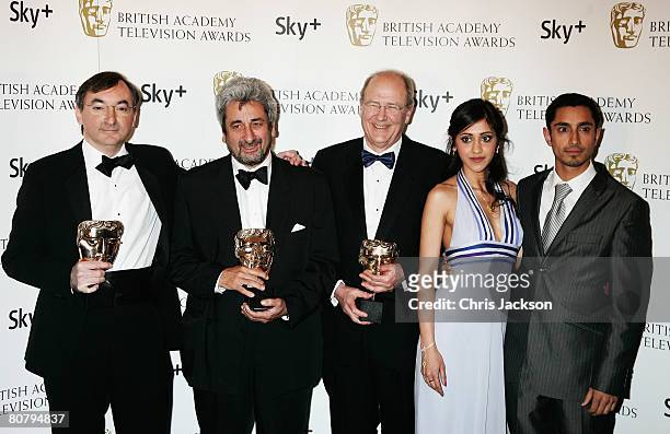 Peter Kosminsky, David Aukin, Steve Clark-Hall, Manjinder Virk and Riz Ahmed pose with the award for Best Drama Serial for 'Britz' at the British...