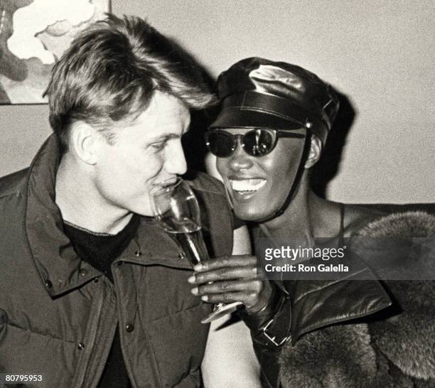 Actor Dolph Lundgren and singer Grace Jones attending "Grace Jones Concert Party" on January 1, 1984 at the Kamikaze Club in New York City, New York.