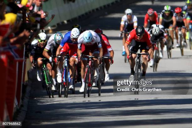 Peter Sagan of Slovakia riding for Bora-Hansgrohe and Mark Cavendish of Great Britain riding for Team Dimension Data are involved in a crash near the...