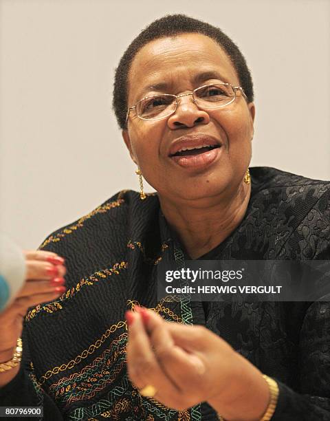 Graca Machel-Mandela, the wife of former South African President and Nobel prize winner Nelson Mandela, talks during a press conference after...