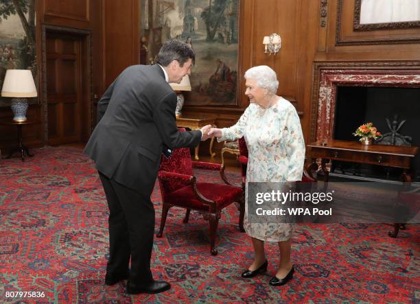 Queen Elizabeth II meets with the Presiding Officer of the Scottish Parliament Ken Macintosh during an audience at the Palace of Holyroodhouse on...