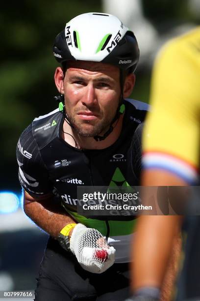 Mark Cavendish of Great Britain riding for Team Dimension Data rides in next to Juraj Sagan of Slovakia riding for Bora-Hansgrohe following stage...