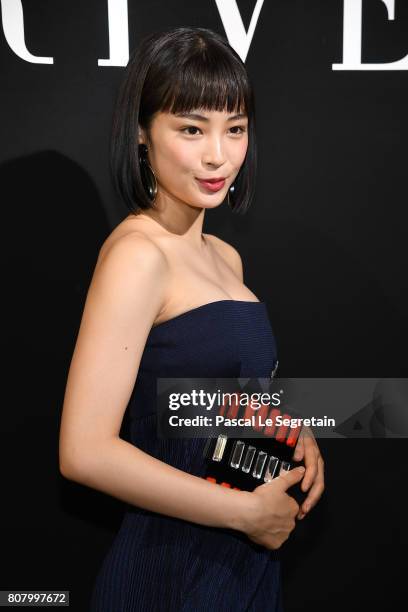 Suzu Hirose attends the Giorgio Armani Prive Haute Couture Fall/Winter 2017-2018 show as part of Haute Couture Paris Fashion Week on July 4, 2017 in...