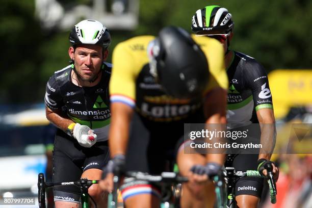 Mark Cavendish of Great Britain riding for Team Dimension Data rides in next to Juraj Sagan of Slovakia riding for Bora-Hansgrohe following stage...