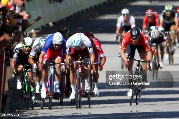 Peter Sagan of Slovakia riding for Bora-Hansgrohe and Mark Cavendish of Great Britain riding for Team Dimension Data are involved in a crash near the...