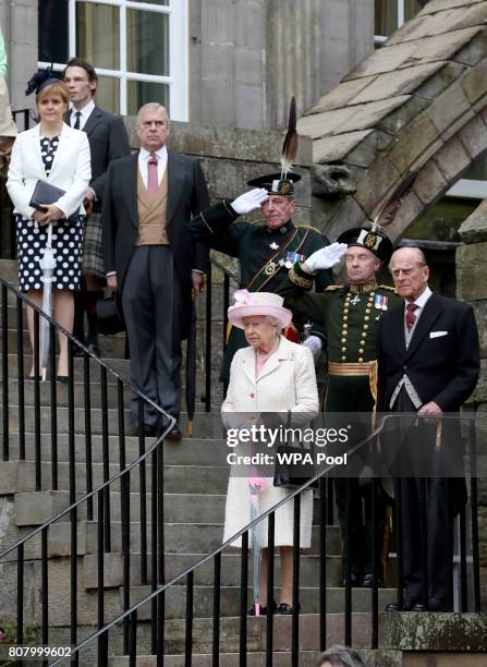 Queen Elizabeth II and Prince Philip, Duke of Edinburgh accompanied by Prince Andrew, Duke of York and First Minister Nicola Sturgeon attend the...