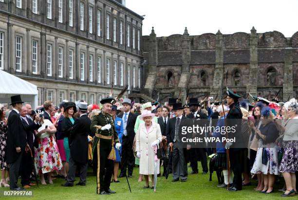 Queen Elizabeth II attends the annual garden party at the Palace of Holyroodhouse on July 4, 2017 in Edinburgh, Scotland.