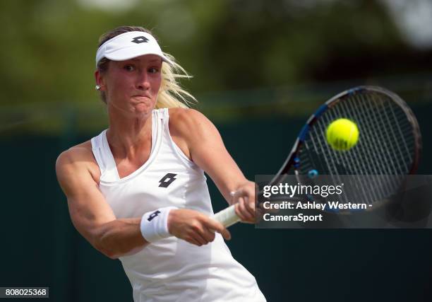 Denisa Allertova of The Czech Republic in action during her victory over Lisa Ozaki of Japan in their Ladies' Singles First Round Match at Wimbledon...