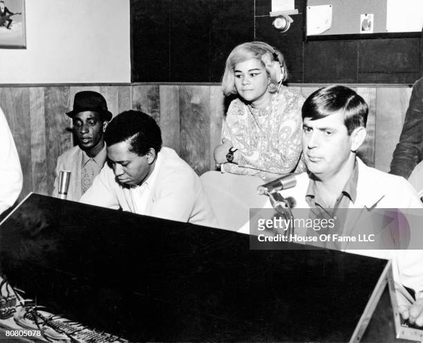 And B singer Etta James recording at Fame Studios with Rick Hall and members of the house band in circa 1967 in Muscle Shoals, Alabama.