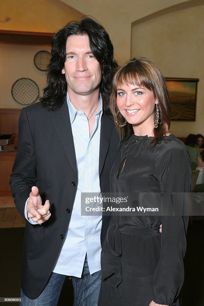 Tommy Thayer and Wife Amber at "A Plumm Summer" after party on April