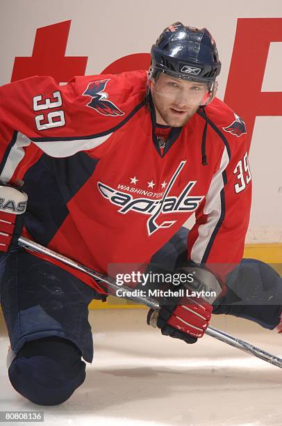 David Steckel of the Washington Capitals stretches in warm-ups during game five of the 2008 NHL Stanley Cup Playoffs Eastern Conference Quaterfinals...