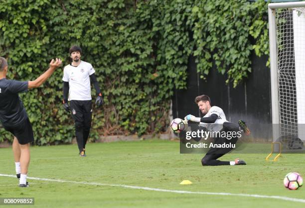 Goalkeepers of Besiktas Tolga Zengin and Fabricio Agosto Ramirez attend the team's training session within the preparations for next soccer season at...