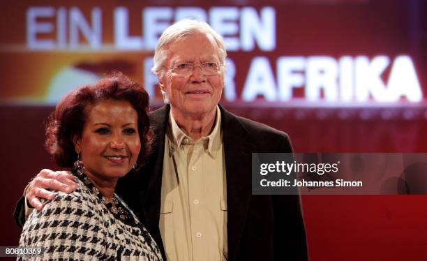 German actor Karlheinz Boehm and his wife Almaz pose during a press conference at Bavaria Film television studios on April 21, 2008 in Gruenwald,...