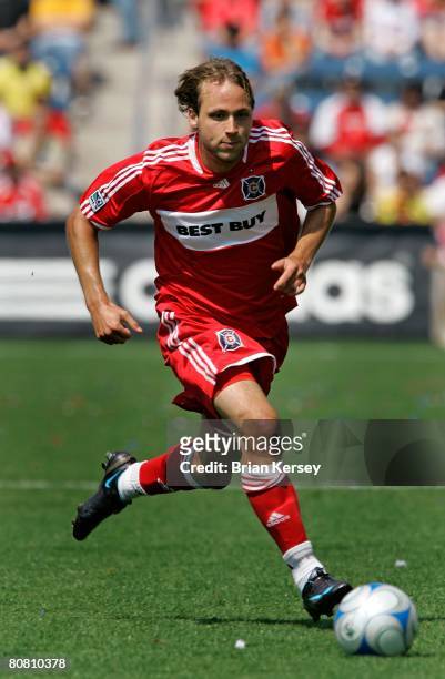 Justin Mapp of the Chicago Fire moves the ball up the field during the first half Kansas City Wizards at Toyota Park on April 20, 2008 in Bridgeview,...