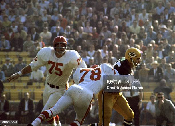 Kansas City Chiefs Hall of Fame linebacker Bobby Bell sacks Green Bay Packers Hall of Fame quarterback Bart Starr during Super Bowl I, a 35-10...