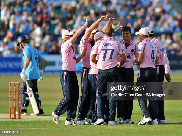 Middlesex's Tim Murtagh is congratulated after taking the wicket of Sussex's Murray Goodwin during the Friends Provident T20, South Group match at...