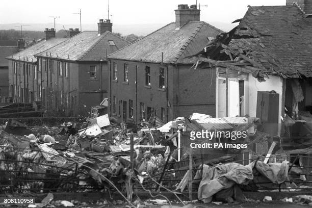 Debris strewn gardens in Lockerbie, after a Pan Am jumbo jet was bombed and crashed onto the town, killing all 259 on board and 11 people on the...