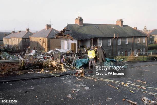 The scene of devastation in Lockerbie after a Pan Am Boeing 747 was bombed and crashed, killing all 259 on board and 11 people on the ground.