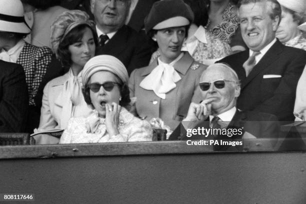 Queen Elizabeth II in the Royal Box on Centre Court at Wimbledon for the Women's final between Britain's Virginia Wade and Betty Stove of the...