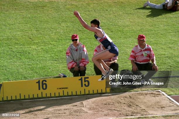 Great Britain's Jonathan Edwards breaks the world record by jumping 18.29 m