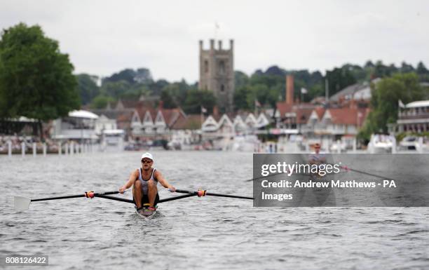 Great Britain's Paul Hamblett and New Zealand's Mahe Drysdale in their Diamond challenge Skulls race, during the Henley Royal Reggatta at...