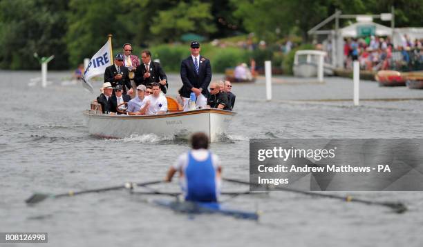 The Umpire, Sir Matthew Pinsent on the Umpire's launch watches closely as Clyde amateur Rowing Club's James Murphy races against New Zealand's Duncan...