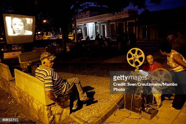 William Domingo Leyva projects a 16mm movie in a park during the low-budget film festival, Festival Internacional del Cine Pobre, April 19, 2008 in...