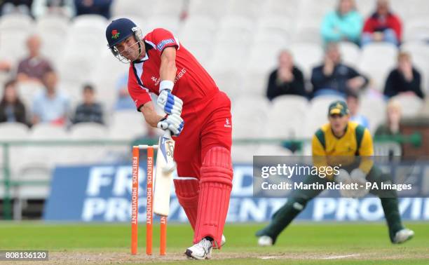 Lancashire Lightning's Stephen Moore hits for 6 against Nottinghamshire Outlaws during the Friends Provident T20, North Group match at Old Trafford...