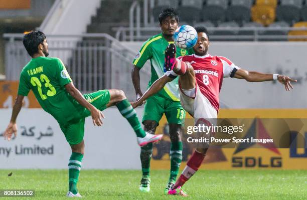 South China midfielder Mahama Awal fights for the ball with Maziya Sports & Recreation midfielder Yaamin during the AFC Cup 2016 Group Stage Match...