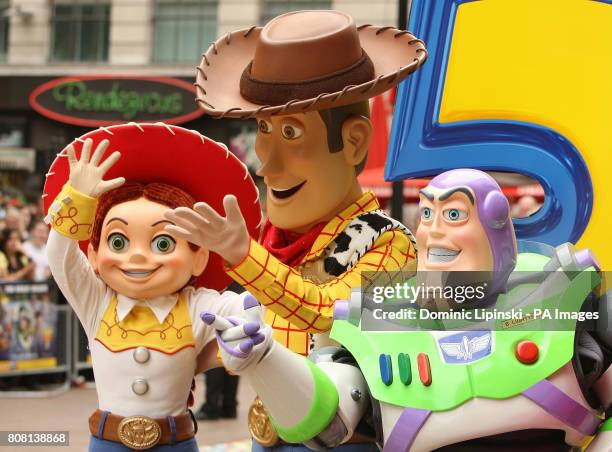 Toy Story characters Jessie, Woody and Buzz Lightyear at the UK premiere of Toy Story 3 in Leicester Square, central London.