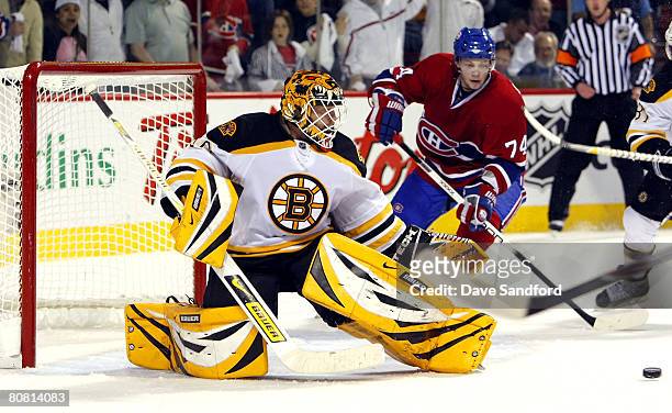 Sergei Kostitsyn of the Montreal Canadiens eyes the puck as he is about to score against Tim Thomas of the Boston Bruins during Game Seven of the...