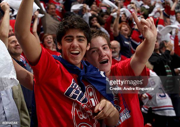 Two young fans of the Montreal Canadiens cheer on their team during game seven of the 2008 NHL conference quarter-final series against the Boston...