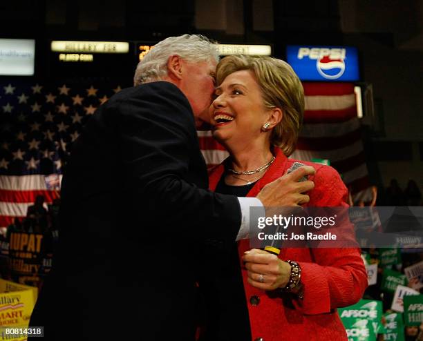 Democratic presidential hopeful U.S. Senator Hillary Clinton attends a campaign rally with her husband former President Bill Clinton at University of...