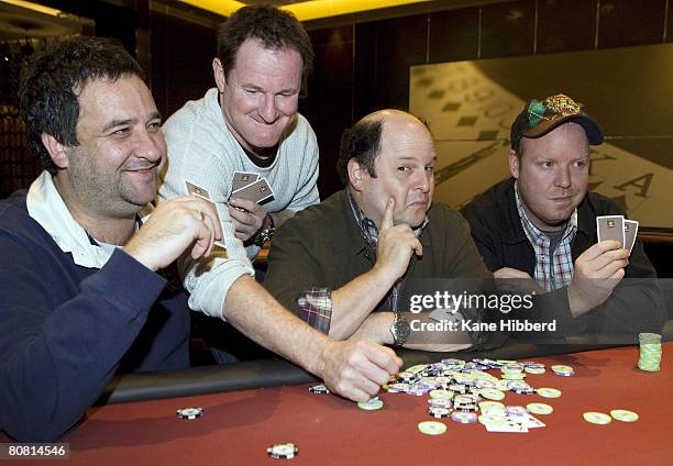 Comedians Mick Molloy, Russell Gilbert, Jason Alexander and Peter Helliar pose at a card table after a press conference to announce the start of...