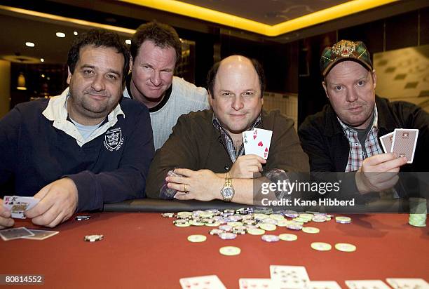 Comedians Mick Molloy, Russell Gilbert, Jason Alexander and Peter Helliar pose at a card table after a press conference to announce the start of...